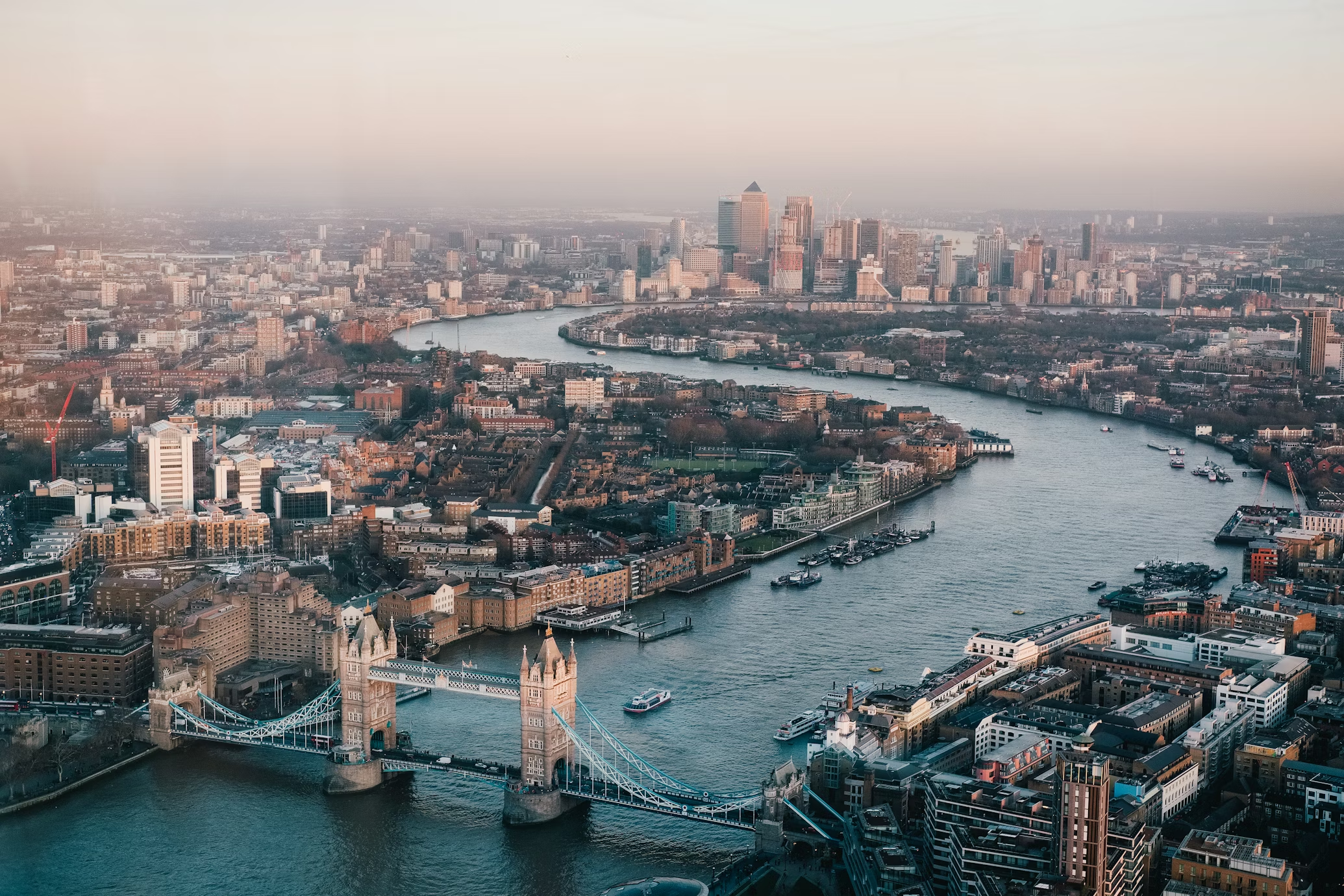 Aerial view of London with the Thames, Tower Bridge and Canary Wharf